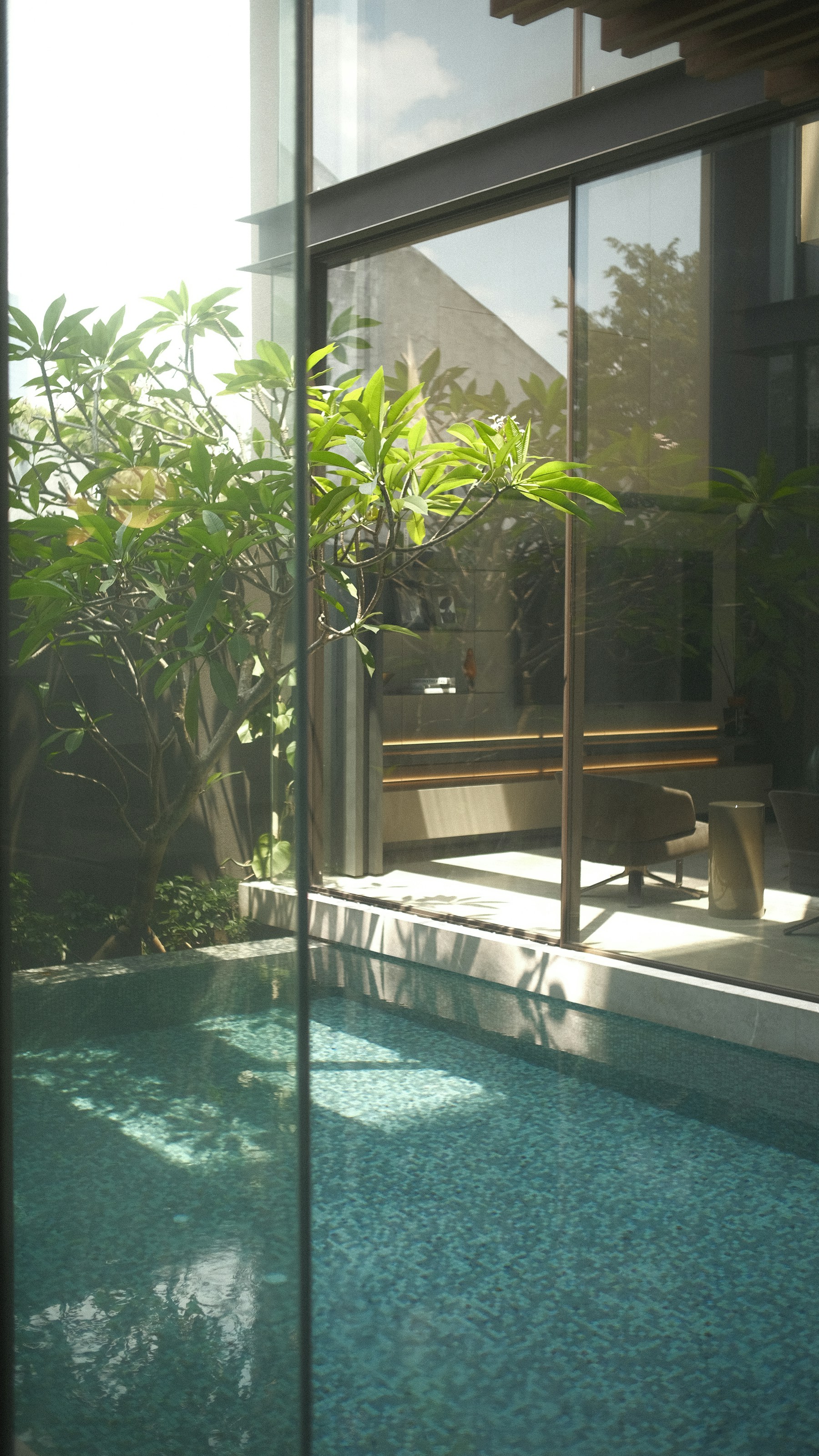 A serene modern indoor pool surrounded by greenery